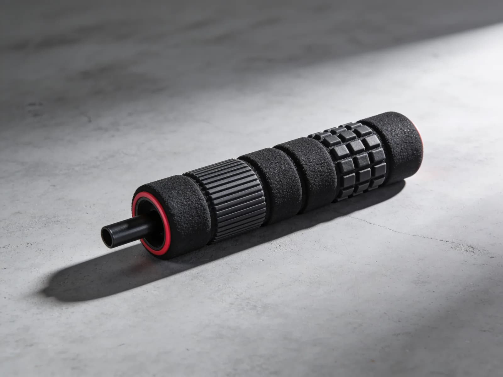 Grid Roller 13 — Hollow core, three textured zones, firm.