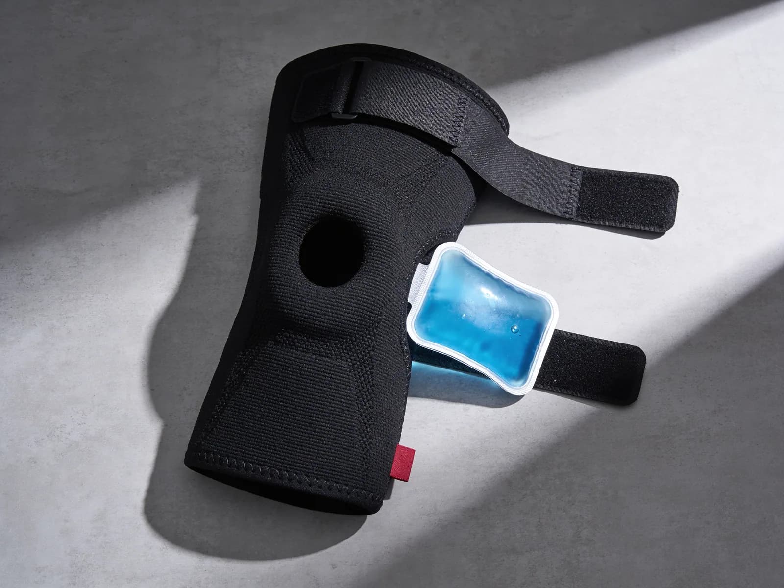 Knee Wrap — Strapped wrap with a removable gel insert.