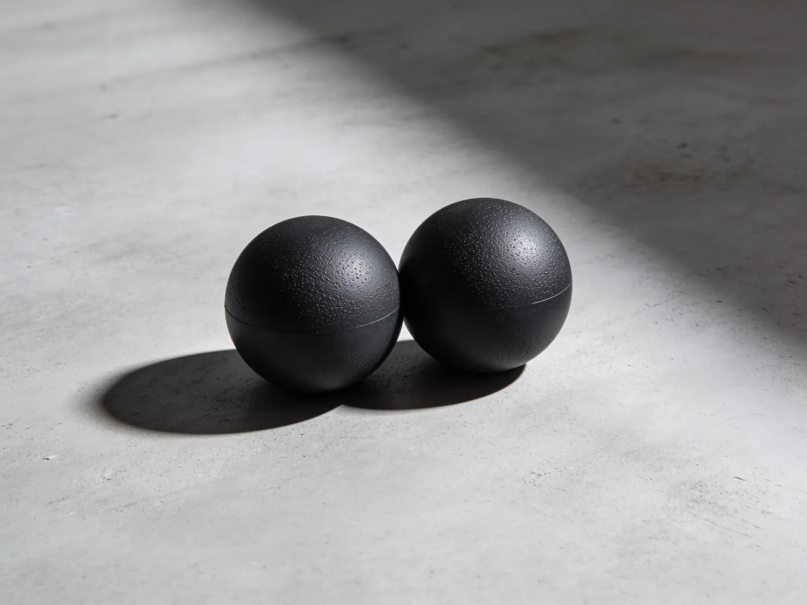 Massage Ball Pair — Two 2.5 in solid rubber balls. Firm.